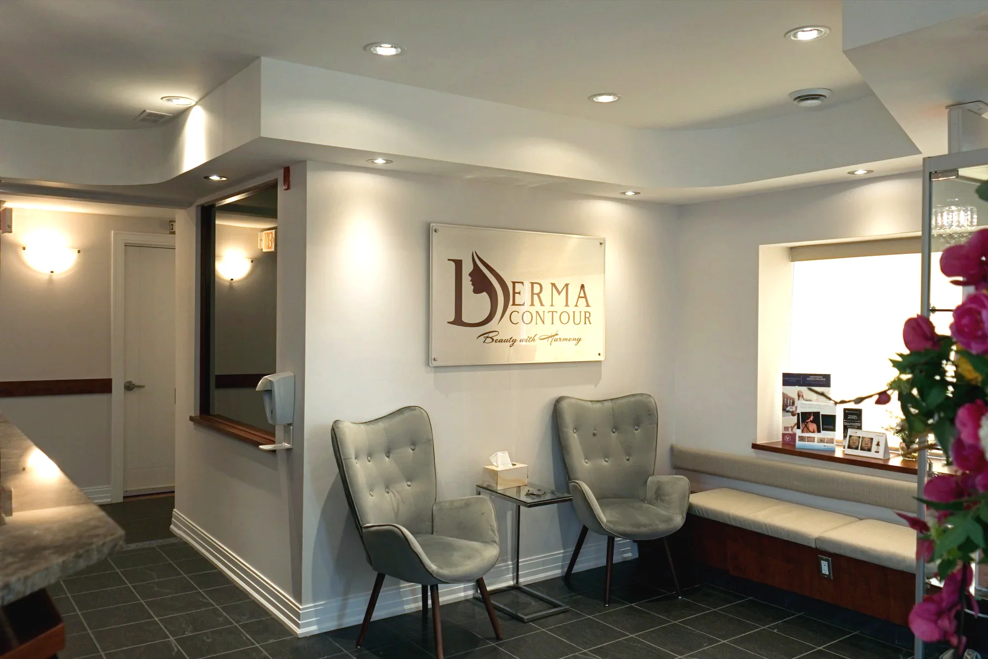 Derma Contour Ottawa waiting area with illuminated logo